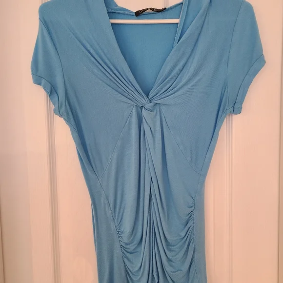 A size small casual shirt. - Picture 3 of 4